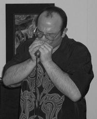 Will Vogtman plays blues harp